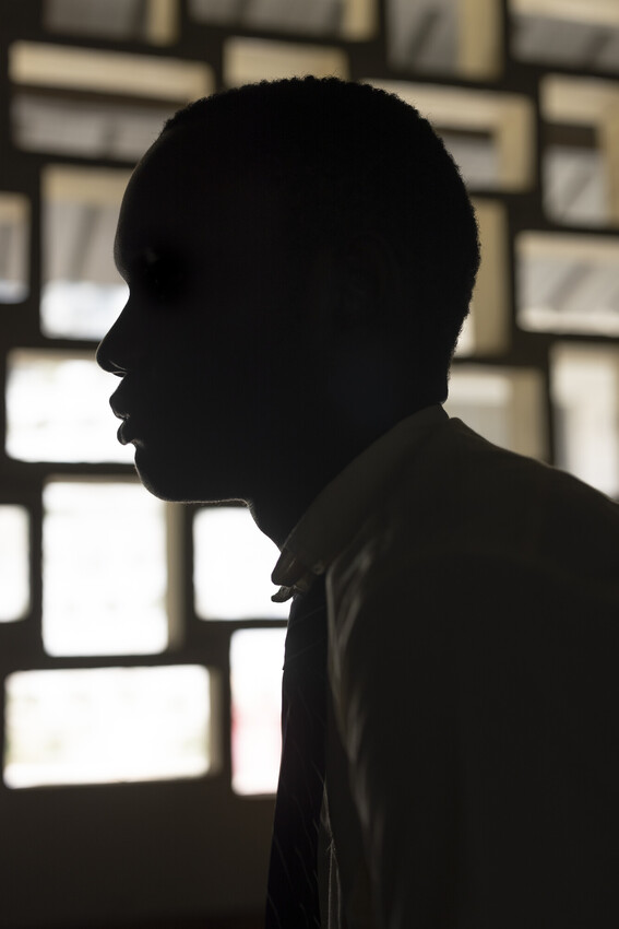 A young man's silhouetted profile in Kenya.