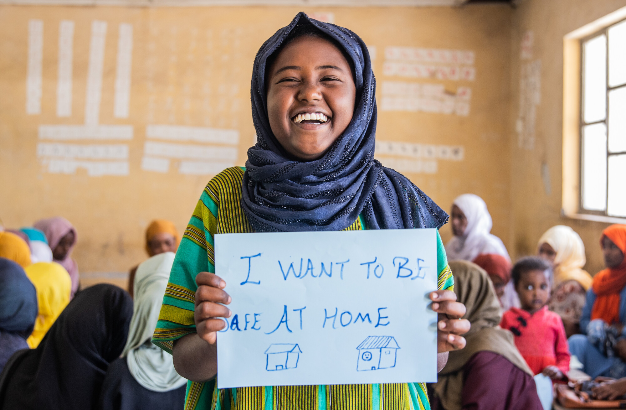 A youth participant in ChildFund Ethiopia’s CPiE (Child Protection in Emergencies), which aims to curb child trafficking, pauses for a photo.