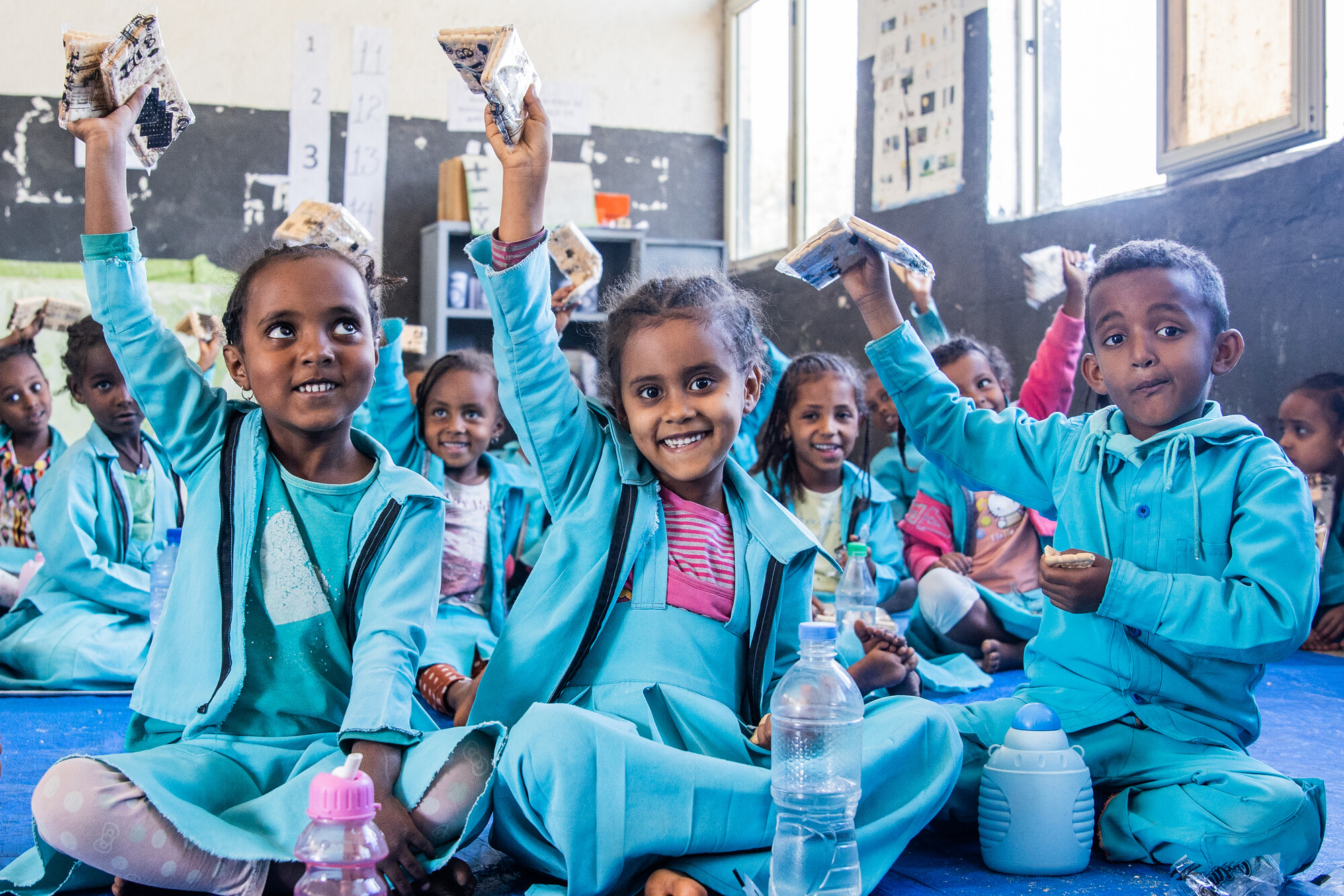 Children enjoy high-nutrition, protein-packed biscuits at a ChildFund-supported preschool in the Amhara Region as part of our emergency response to conflict in northern Ethiopia.