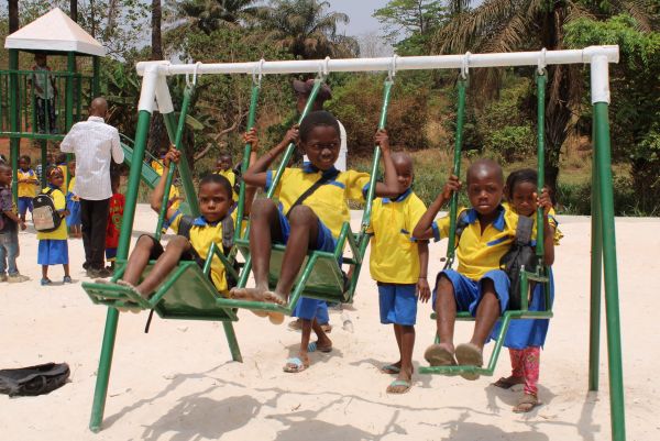 Playground Children play at a primary school supported by ChildFund Guinea.