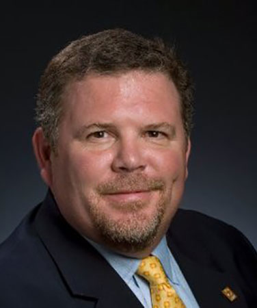 Headshot of Adam Hicks, Chief Marketing Officer